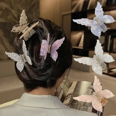 Aureliia French Retro Butterfly Hair Claw Clips in various colors, enhancing messy bun hairstyles and beauty products.